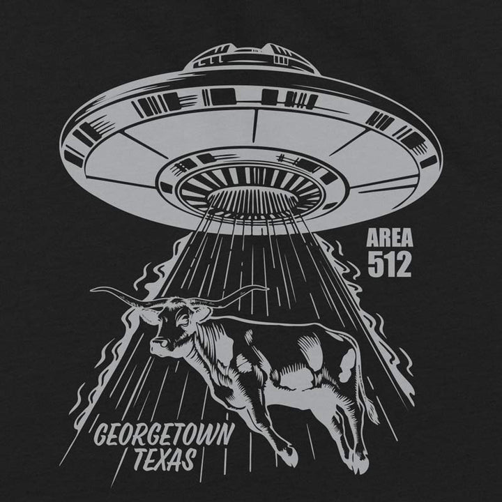 Close-up of metallic silver screen print on Georgetown Area 512 youth t-shirt showing UFO and Texas longhorn graphic detail.