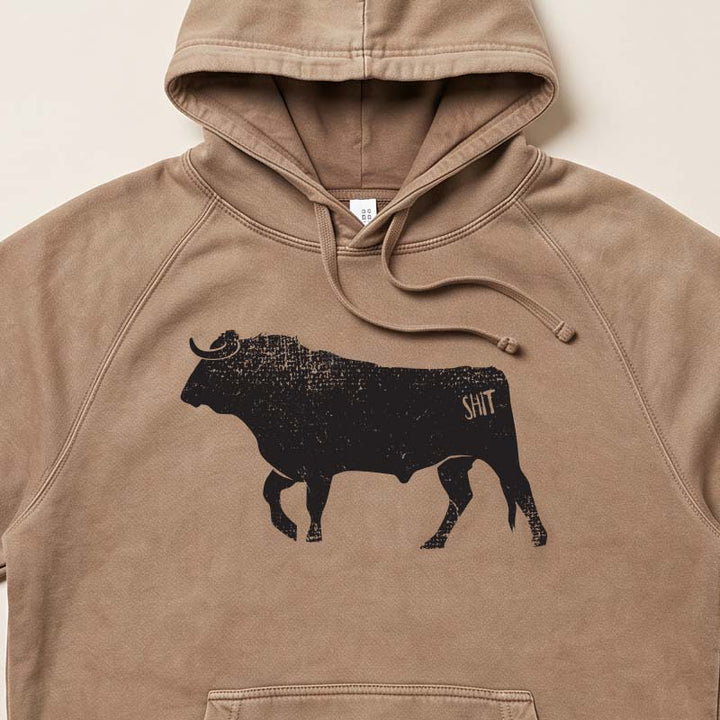A close-up of a brown hoodie featuring a distressed black bull graphic on the chest with the text &