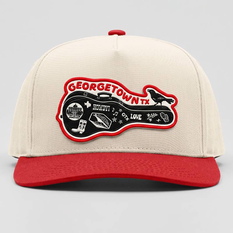 Carry-On Georgetown Hat in cream and red featuring a Georgetown guitar-case patch with grackle detail on a Richardson five-panel snapback cap, photographed on a clean light gray background.