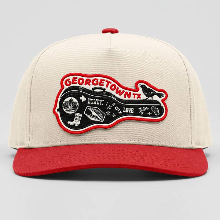 Carry-On Georgetown Hat in cream and red featuring a Georgetown guitar-case patch with grackle detail on a Richardson five-panel snapback cap, photographed on a clean light gray background.