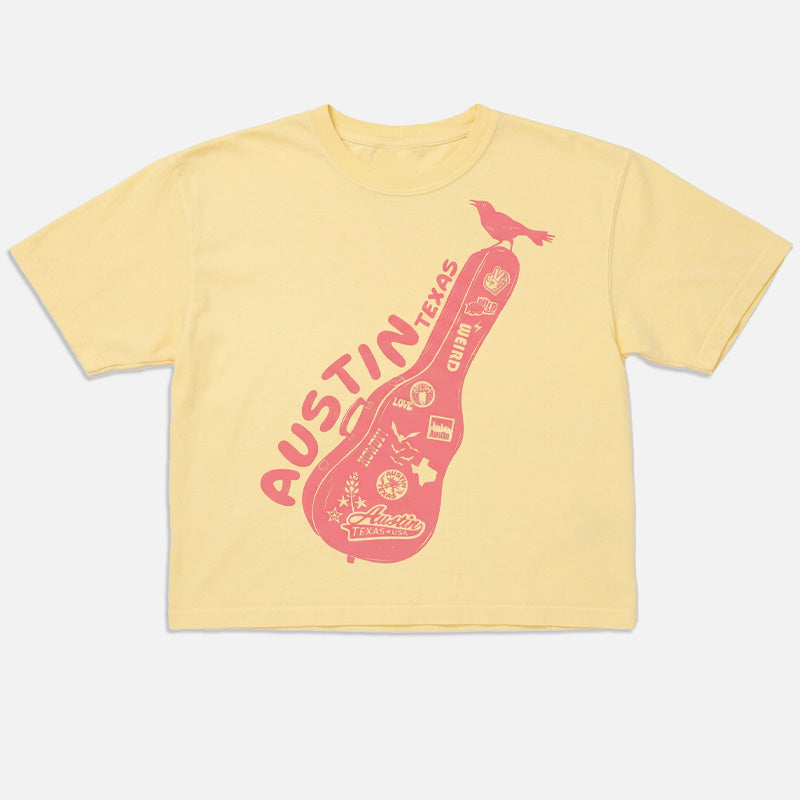 Flay lay of Carry-On Austin women’s heavyweight t-shirt in butter