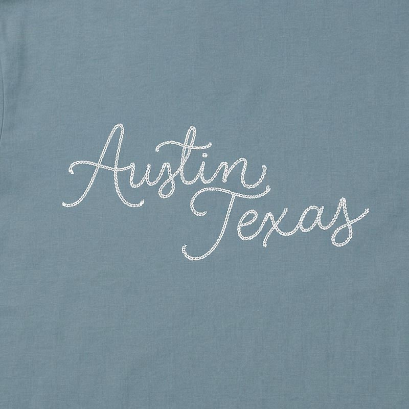 Close-up of Austin Texas chainstitch-style script graphic