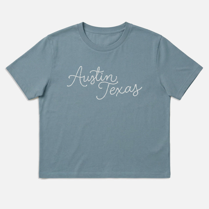 Flat lay front view of Chainstitch Austin women’s heavyweight t-shirt