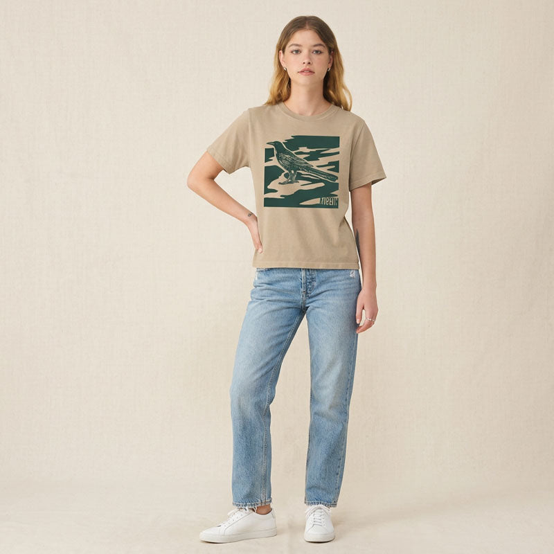 model wearing Women’s garment-dyed boxy tee in khaki with tone-on-tone green camo design