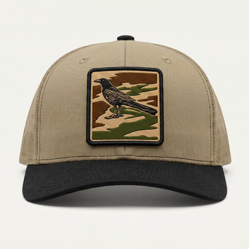 City Camo Grackle trucker hat on a Richardson 112 snapback in khaki and black featuring a detailed UV printed patch designed to look embroidered.
