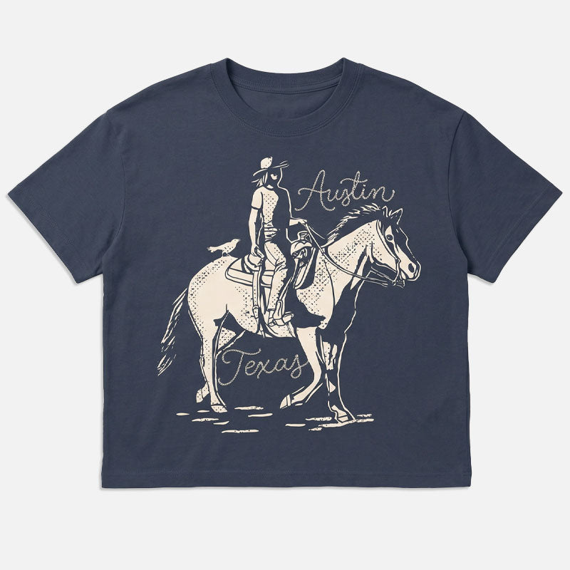 Flay lay front view of Dust & Reins Austin women’s heavyweight t-shirt