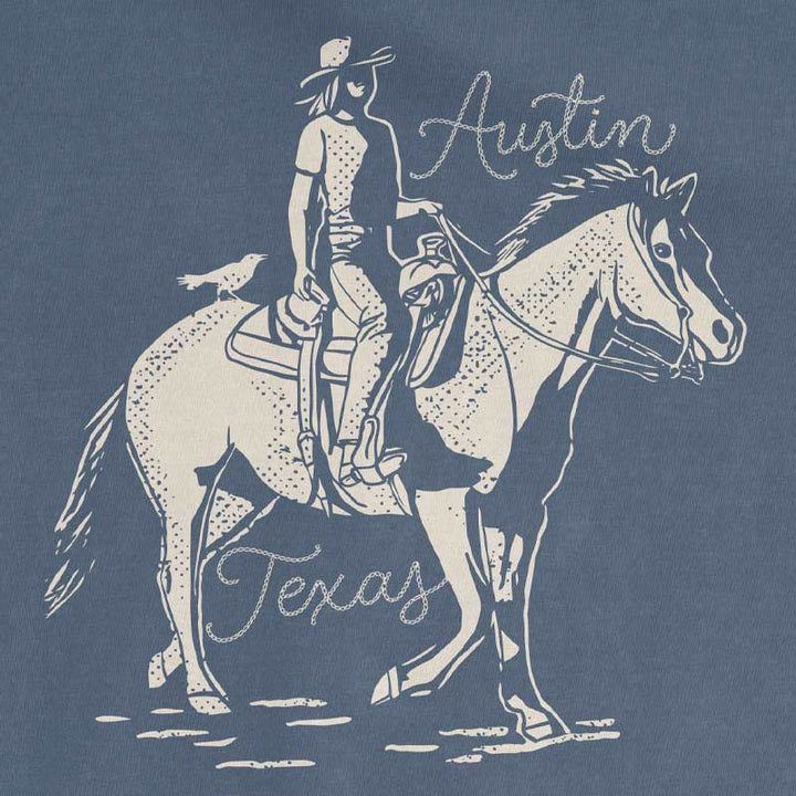 Close-up of Dust and Reins Austin design on heavyweight t-shirt