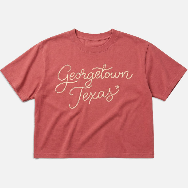 Georgetown Texas women’s boxy t-shirt in garment-dyed red with vintage chainstitch-style script graphic and relaxed cropped fit