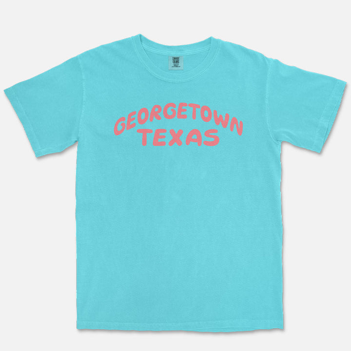 Lagoon Georgetown Texas graphic tee with bold coral typography design