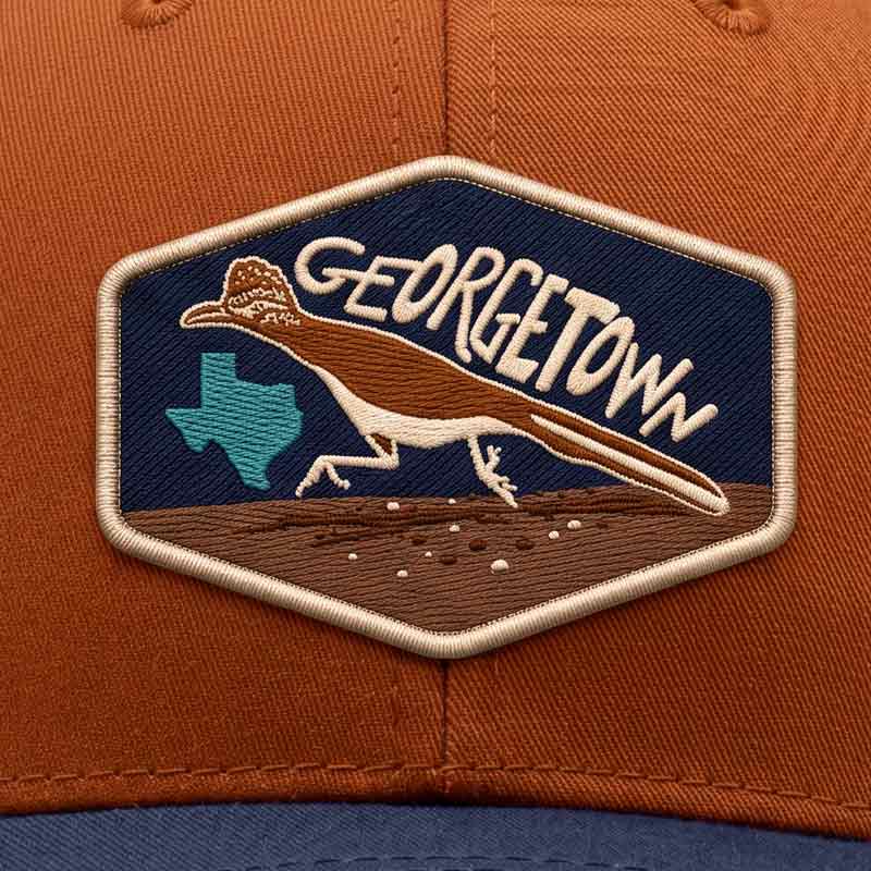 Close-up of the UV Printed Georgetown Road Runner patch showing detailed faux embroidered texture and Texas-inspired artwork.