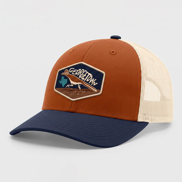 Angled view of the Georgetown Road Runner Richardson 115 trucker hat showing the curved brim, mesh back, and detailed road runner patch.
Back