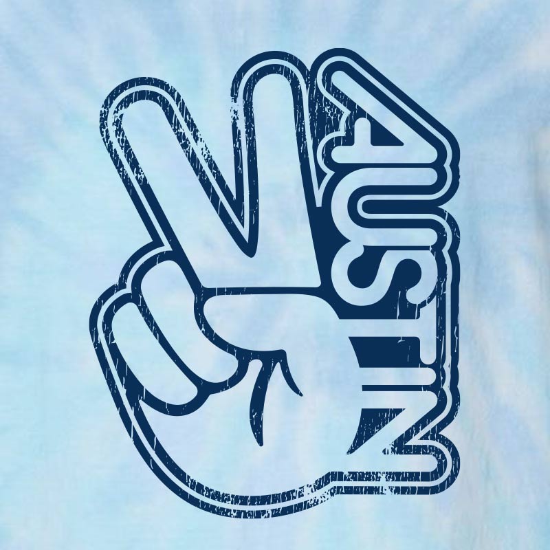 Blue Lagoon tie-dye t-shirt with shades of aqua, sky blue, and white featuring a vintage-style navy Austin peace sign graphic printed on the front of a relaxed unisex tee.