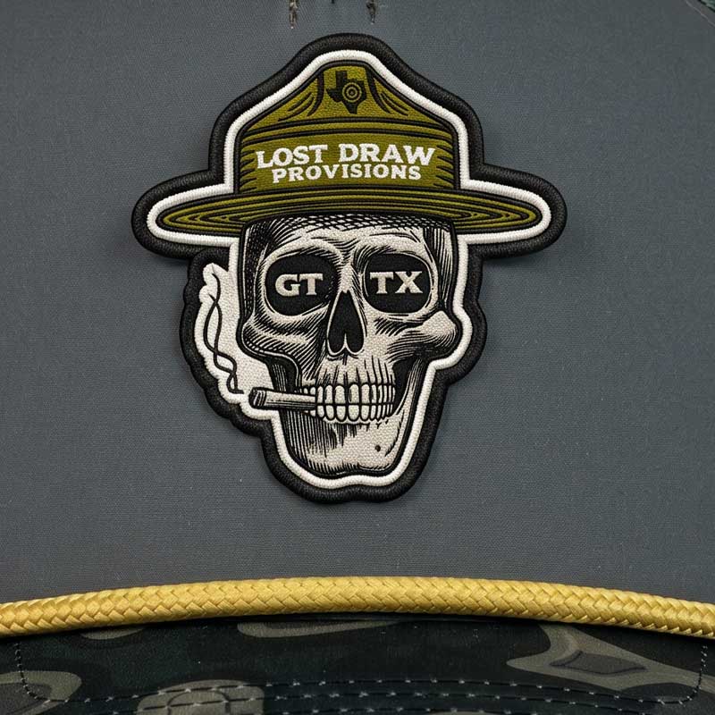 Close-up of the GTX Ranger Hat patch featuring a detailed skull wearing ranger-style headwear with “Lost Draw Provisions” text and GTX sunglasses. UV printed leatherette patch designed to look embroidered.