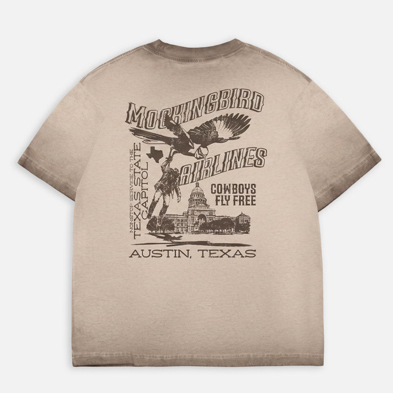 Back of Mockingbird Express Austin Texas oversized heavyweight T-shirt featuring vintage travel-inspired screen print