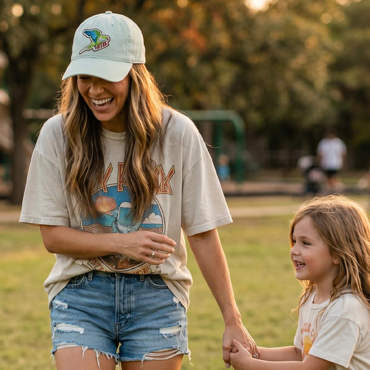 Person wearing Quaker Parrot ATX Hat outdoors in Austin Texas
