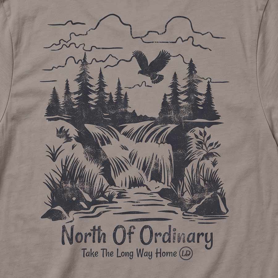 Back of the Pebble Brown North of Ordinary Tee featuring a distressed waterfall and forest graphic with Take the Long Way Home lettering.