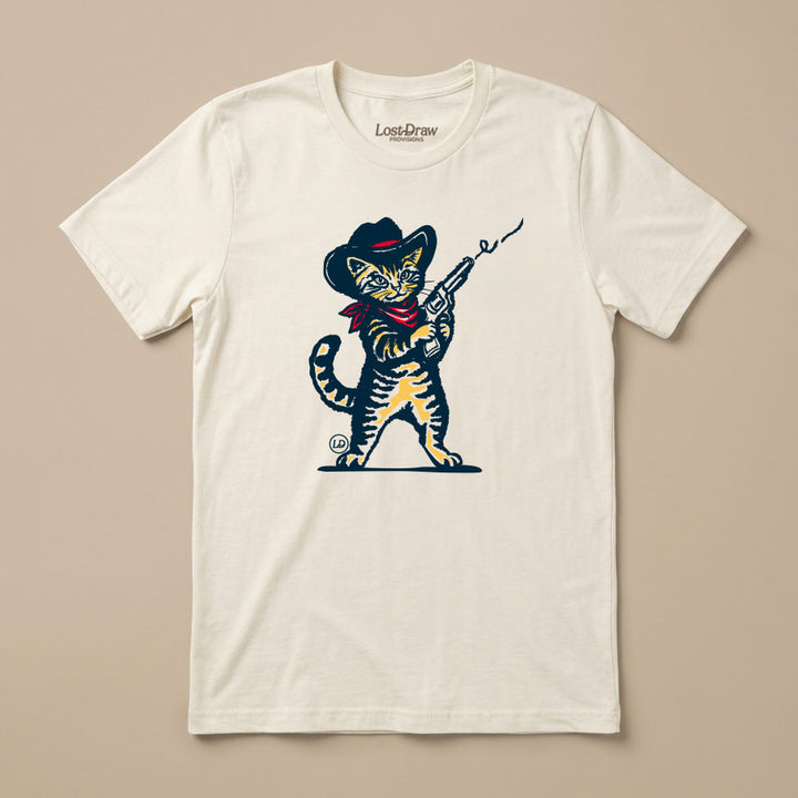 Wilder Than the West cowboy kitten graphic tee on a Bella+Canvas 3001 Vintage White unisex shirt.